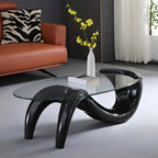 Table basse ovale moderne et abstraite avec plateau en verre et base en métal